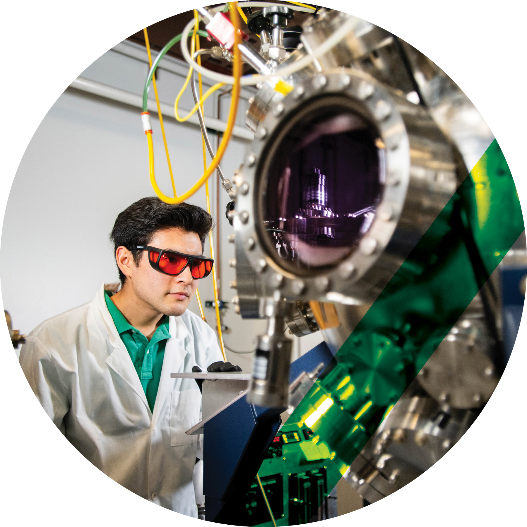 Student at the Center for Microelectronics in Extreme Environments working with lab instruments