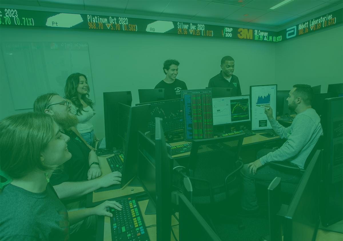 UNT business students at work in the stock trading room.