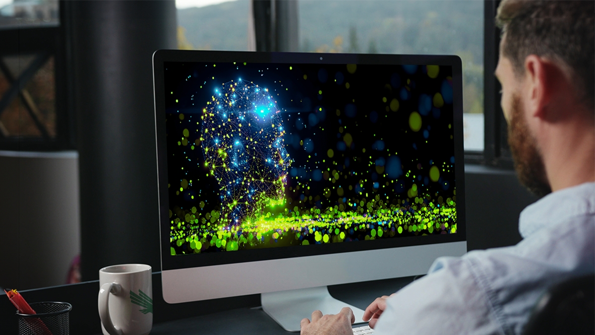 Man working at a desktop computer