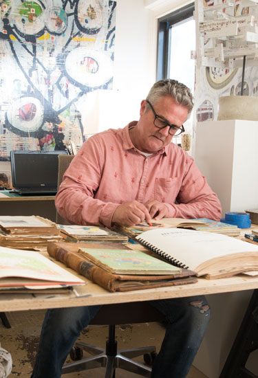 Proessor working on historical art documents