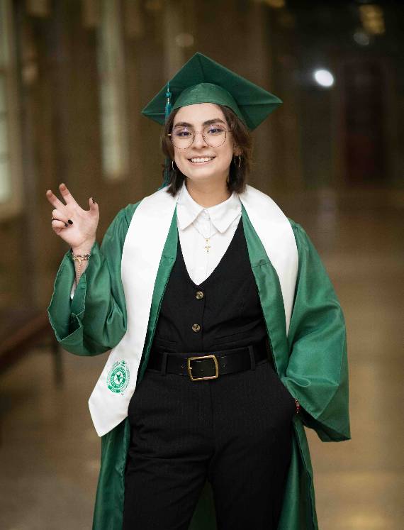 Kassandra Aguilar poses in her commencement regalia.