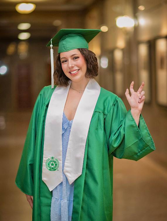 Rachel Richards poses in commencement regalia.