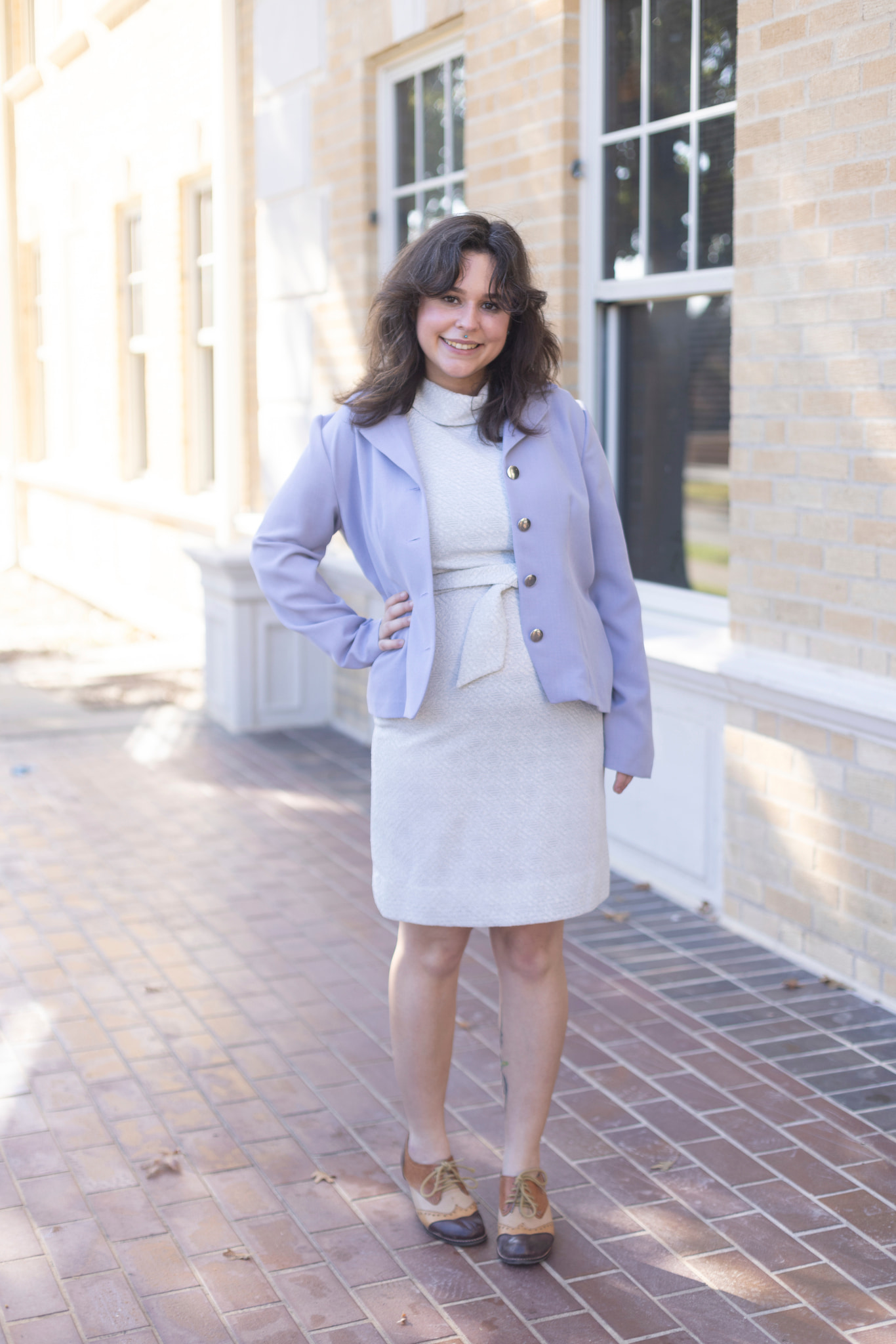 Madeline poses on campus