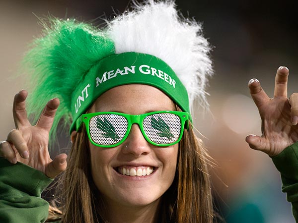 Student in UNT gear doing the Eagle Claw