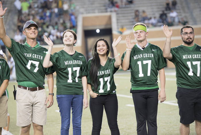 special recognition on the field during a Mean Green football game