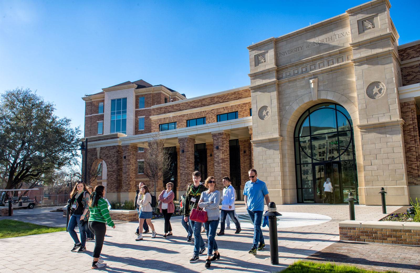 Tour group on campus on a sunny day