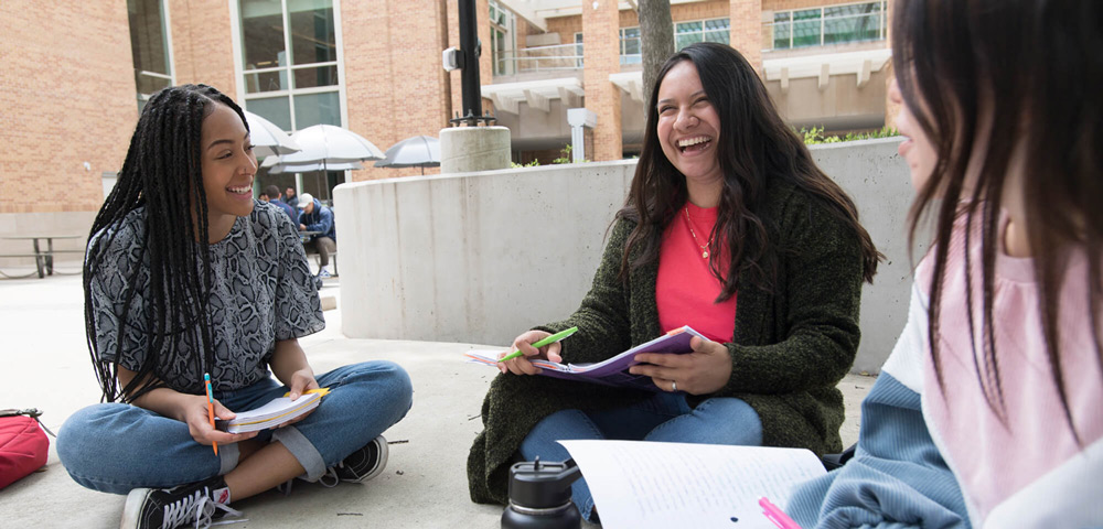 Student studying outside the Union