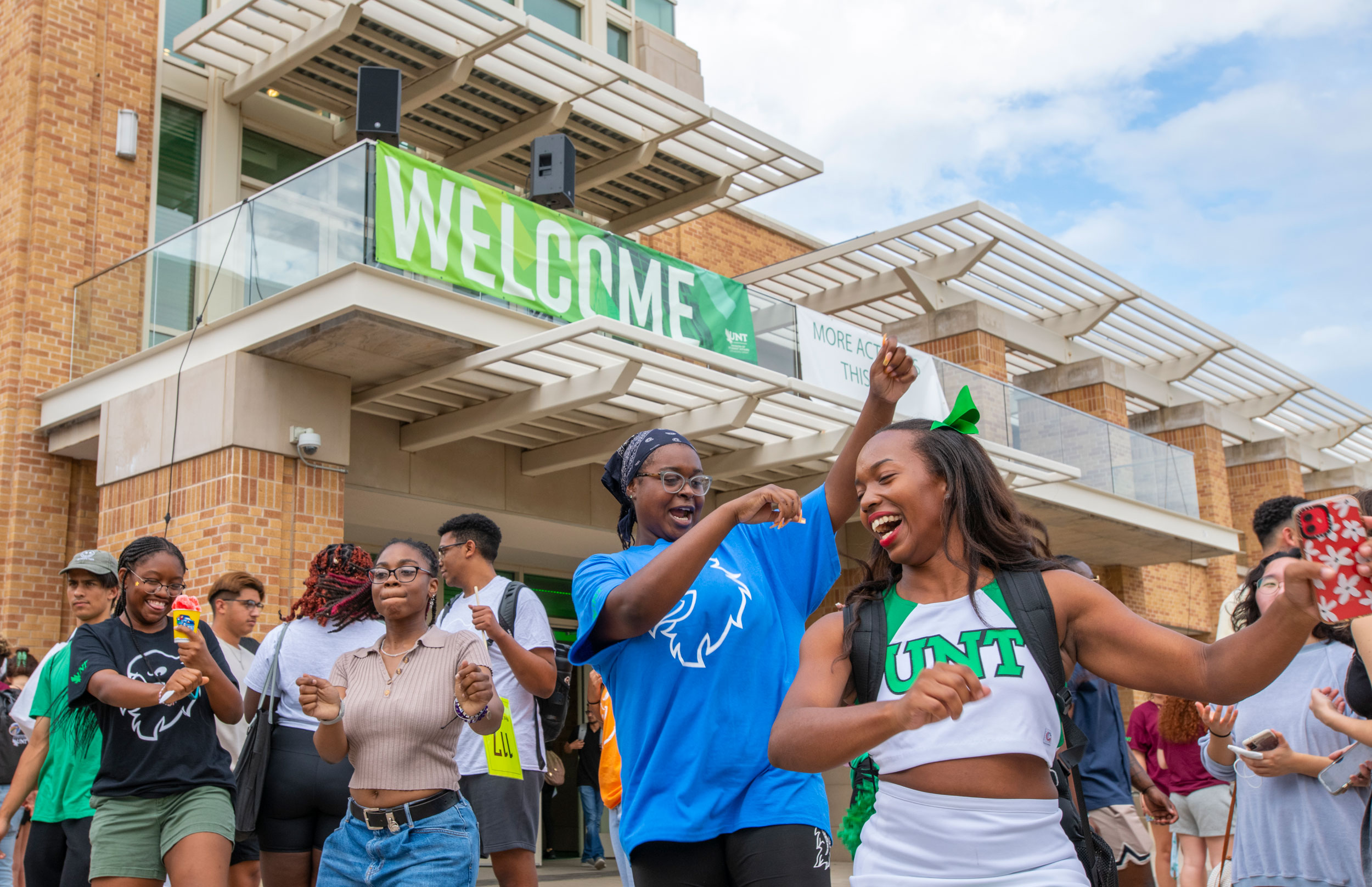 Students dancing in front of the University Union