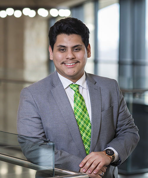 Man wearing suit smiling