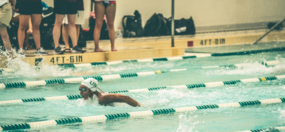 UNT sophomore June Harris competes at a swim meet