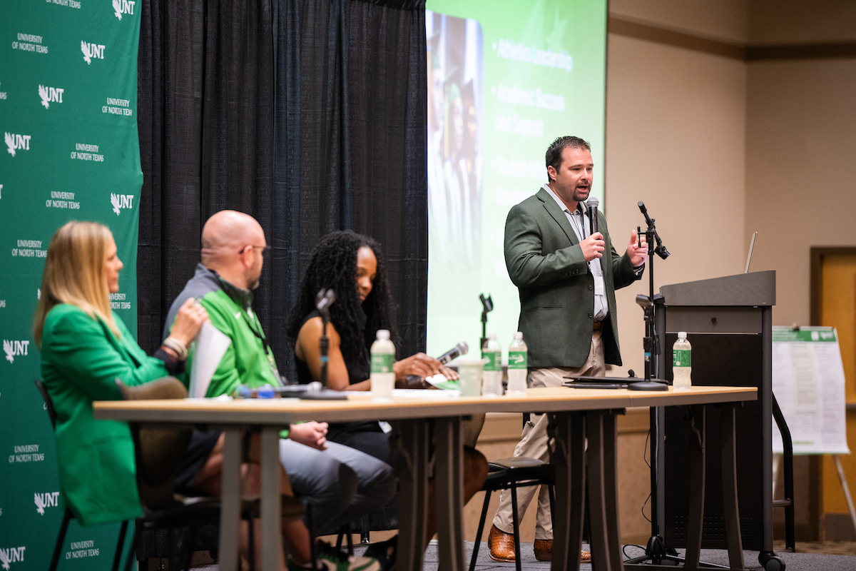 Connor Smith speaking during the UNT Athletics keynote session
