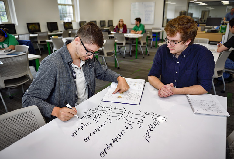 Student and tutor working at the math lab.