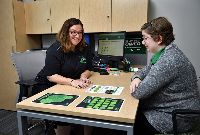 A student receiving counseling in an office